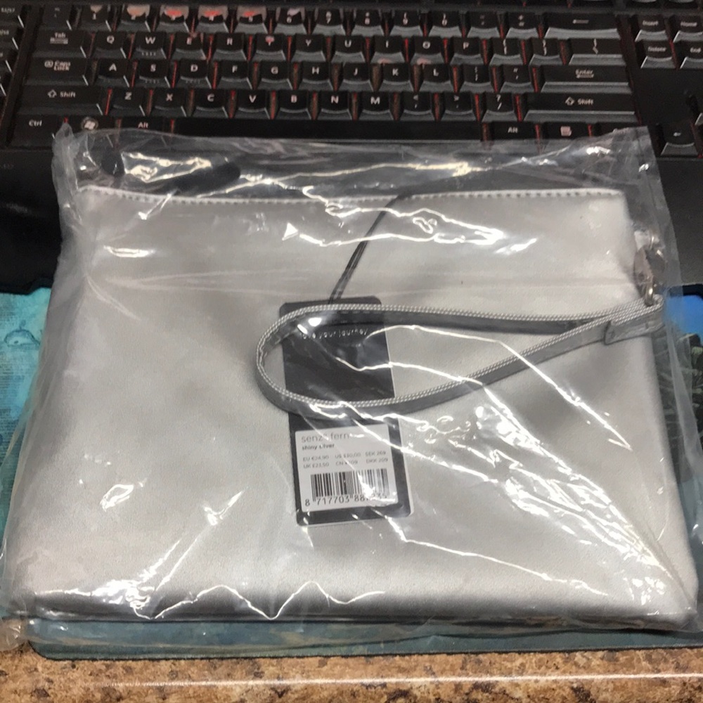 Senz fern shiny silver clutch/ Mini bag New